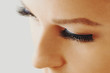© Olesia - Female eye with extreme long false eyelashes. Eyelash extensions, make-up, cosmetics, beauty and skin care