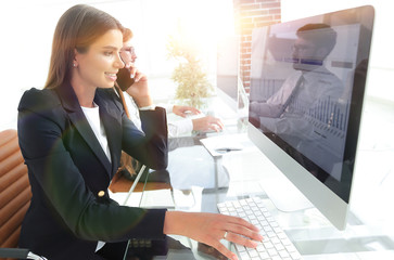 Poster - closeup of business woman talking on smartphone,