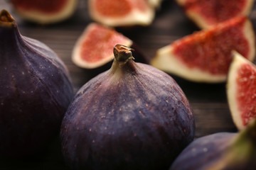 Fresh ripe figs on table, closeup