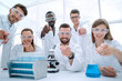 © ASDF - group of lab teachnican working in a modern laboratory