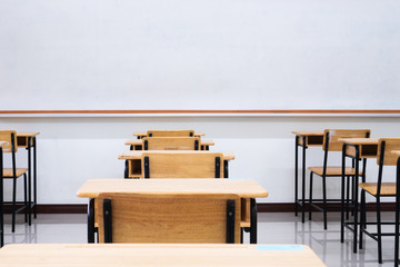 Wall Mural - empty school classroom with desks chair wood, greenboard and whiteboard in high school thailand, vin