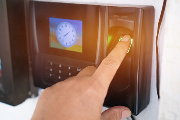 Fingerprint or Thumbprint scanner scan to record at working time in modern office. Easily deposited on suitable surfaces.