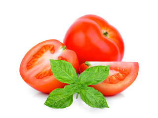Wall Mural - whole and half tomato with basil leaf isolated on white background