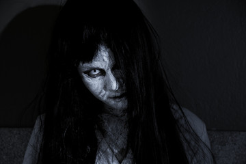 Close up face of horror woman ghost cruel,