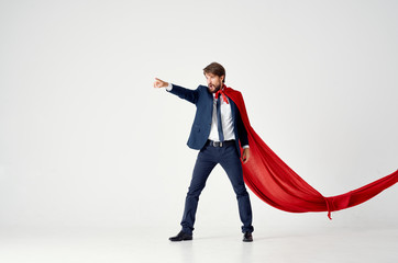 man superman in a red raincoat