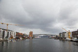 Fototapeta  - Cityscape of a harbor in Bergen, Norway. Overcast day.