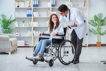 Wall Mural - Disabled patient on wheelchair visiting doctor for regular check