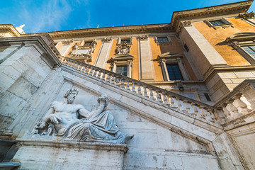 Wall Mural - Tiber statue by Campidoglio facade in Rome