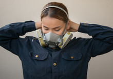 women protection cartridge respirator gas mask - close up.