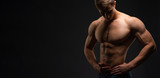 Bodybuilding concept. Strong bodybuilder sports fitness man after bodybuilding training, copy space. person. Strength and Motivation. Banner