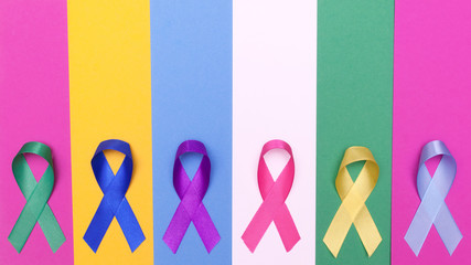 world cancer day background. colorful ribbons, cancer awareness. multi-colored surface. internationa