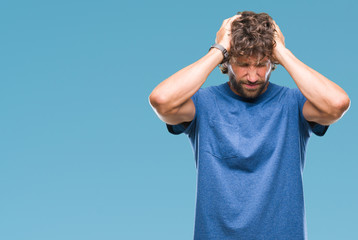 Sticker - Handsome hispanic model man over isolated background suffering from headache desperate and stressed because pain and migraine. Hands on head.