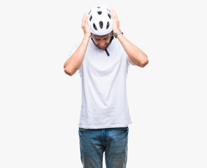 Sticker - Handsome hispanic cyclist man wearing safety helmet over isolated background suffering from headache desperate and stressed because pain and migraine. Hands on head.