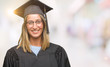 © Krakenimages.com - Young beautiful woman wearing graduated uniform over isolated background with a happy and cool smile on face. Lucky person.