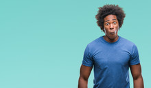 Afro American Man Over Isolated Background Making Fish Face With Lips, Crazy And Comical Gesture. Funny Expression.