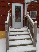 First Snow On House Stairs