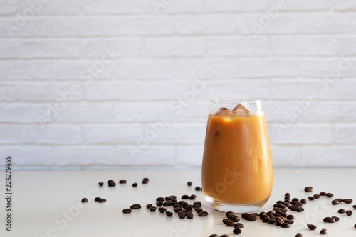 Cuadros en Lienzo a glass of homemade cold cold brew coffee with milk on white table