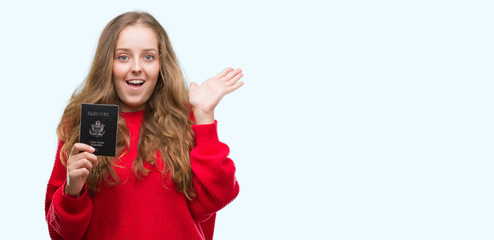 Poster - Young blonde woman holding passport of United States of America very happy and excited, winner expression celebrating victory screaming with big smile and raised hands