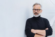 © contrastwerkstatt - Middle-aged bearded man wearing polo neck jumper