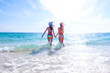 © yellowj - Women run on beach