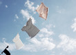 © mootun - Blowing Hung out to dry cloths in the bright sky and warm sun