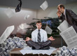 © Nomad_Soul - Businessman meditates among piles of reports