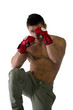 © theartofphoto - Muscular shirtless young man with mixed martial arts gloves MMA , profile view, isolated