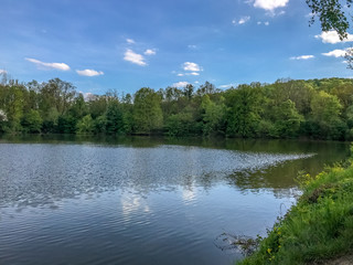 Pond during morning place for fishermans with amazing sky