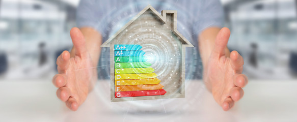 Businessman using 3D rendering energy rating chart in a wooden house