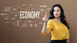 © Tierney - Economy text with business woman on a brown background