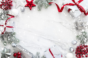 christmas and new year holiday background. xmas greeting card. christmas gifts on white marble backg