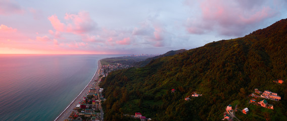 Wall Mural - Aerial view sunset dawn over the Black sea Georgia, Batumi, Kvariati