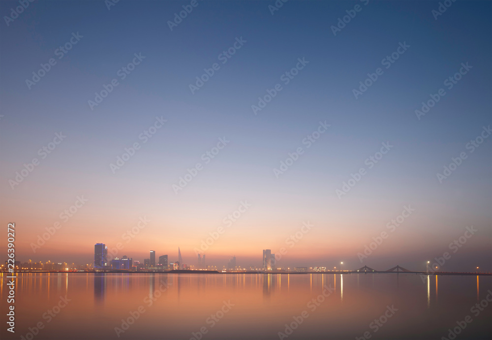 Bahrain skyline at sunset - obrazy, fototapety, plakaty 