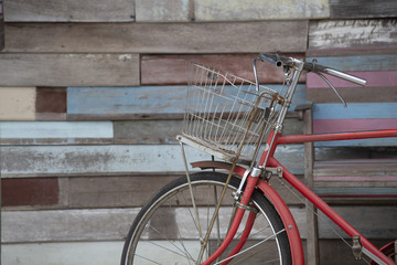 Wall Mural - Bicycle with wood background.Memory concept.