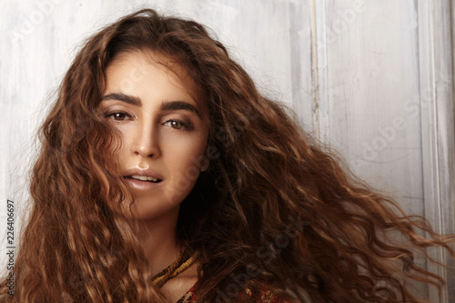 Beautiful Young Woman With Long Curly Hairstyle Fashion Jewelry