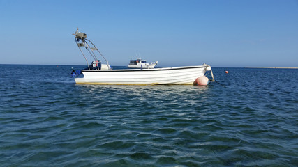 Wall Mural - The beautiful boat in open sea