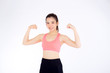 © NT_studio - Beautiful portrait asian woman wear sport clothes have strong and muscle with health, girl show biceps with exercise and workout for wellness isolated on white background, strength and fit concept.