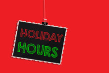 Handwriting Text Writing Holiday Hours. Concept Meaning Schedule 24 Or 7 Half Day Today Last Minute Late Closing Hanging Blackboard Message Communication Information Sign Red Background