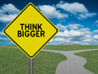 Think Bigger sign motivational concept