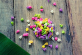 Fototapeta Tulipany - Thai colorful candy on wooden background