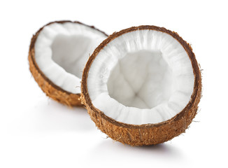 Wall Mural - two halves of ripe coconut isolated on white background