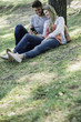 © PhotoAlto - Young couple listening to music on smartphone