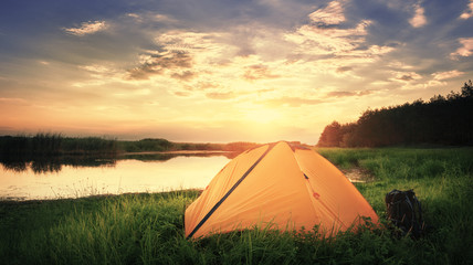 Wall Mural - orange tent by the lake