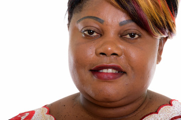 Close up of happy fat black African woman smiling