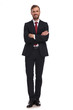 © Viorel Sima - confident businessman standing on white background with arms folded