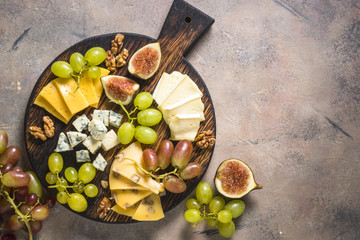 Sticker - Cheese plate with grapes, figs and nuts.