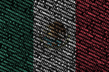 mexico flag is depicted on the screen with the program code. the concept of modern technology and si