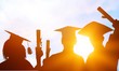© BillionPhotos.com - Fir happy college students graduating, silhouettes