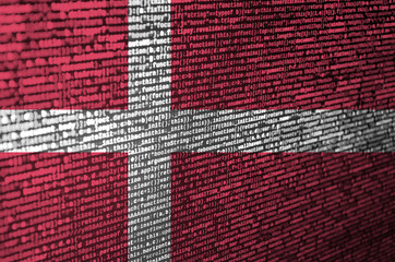 Denmark flag  is depicted on the screen with the program code. The concept of modern technology and site development