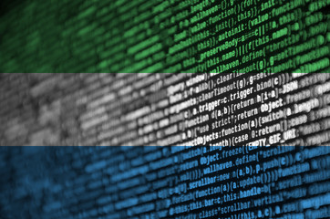 sierra leone flag is depicted on the screen with the program code. the concept of modern technology 